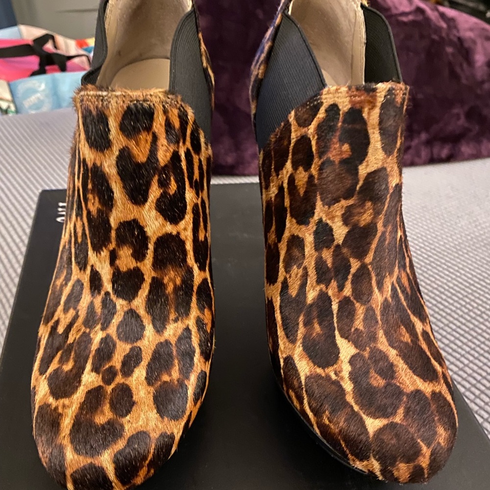 Real Leopard print booties. Just like new. Size 7 1/2.